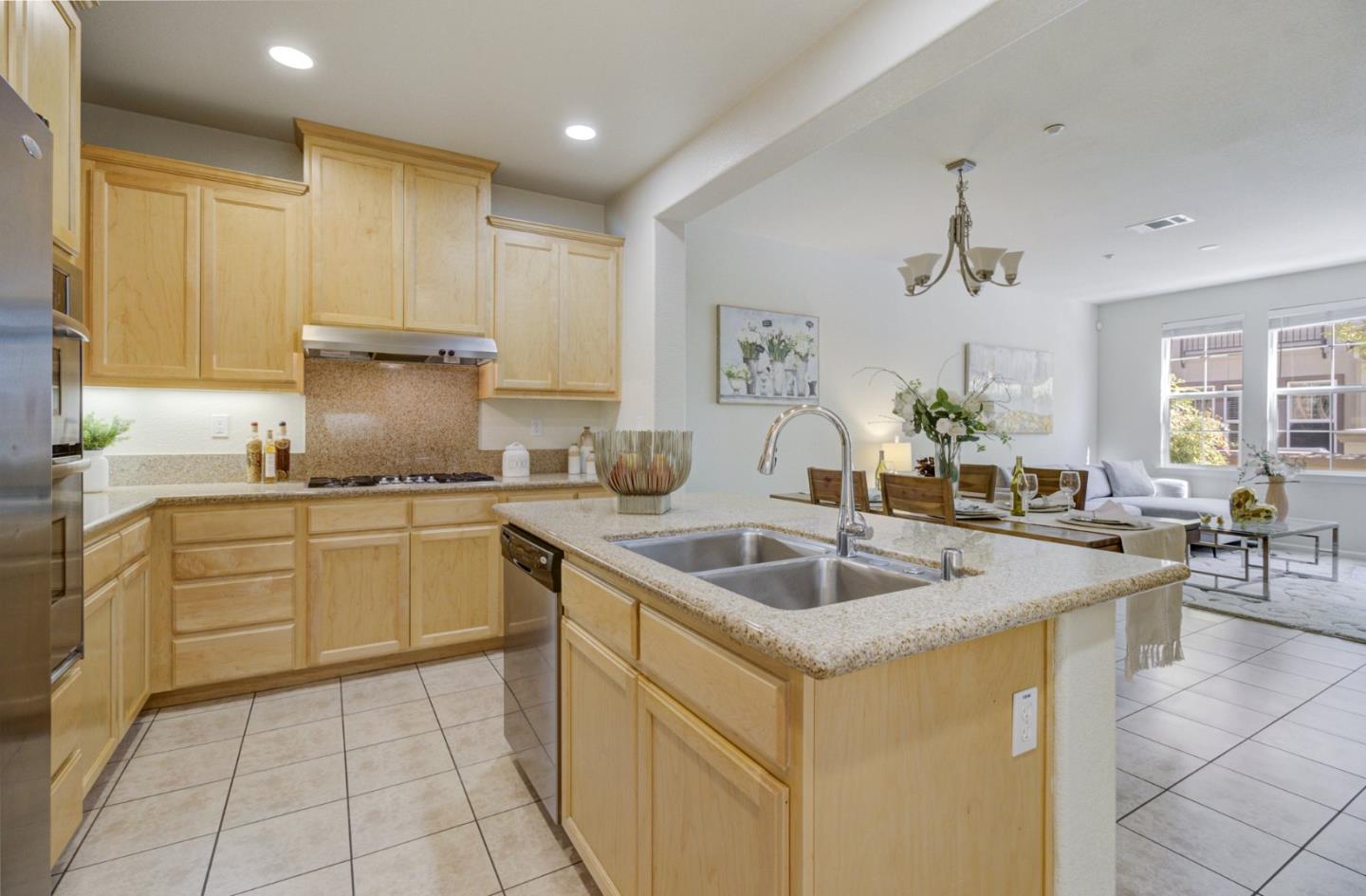 5056 Fioli Loop San Ramon, CA 94582 - Photo 13 of 44 a kitchen with sink cabinets and stove