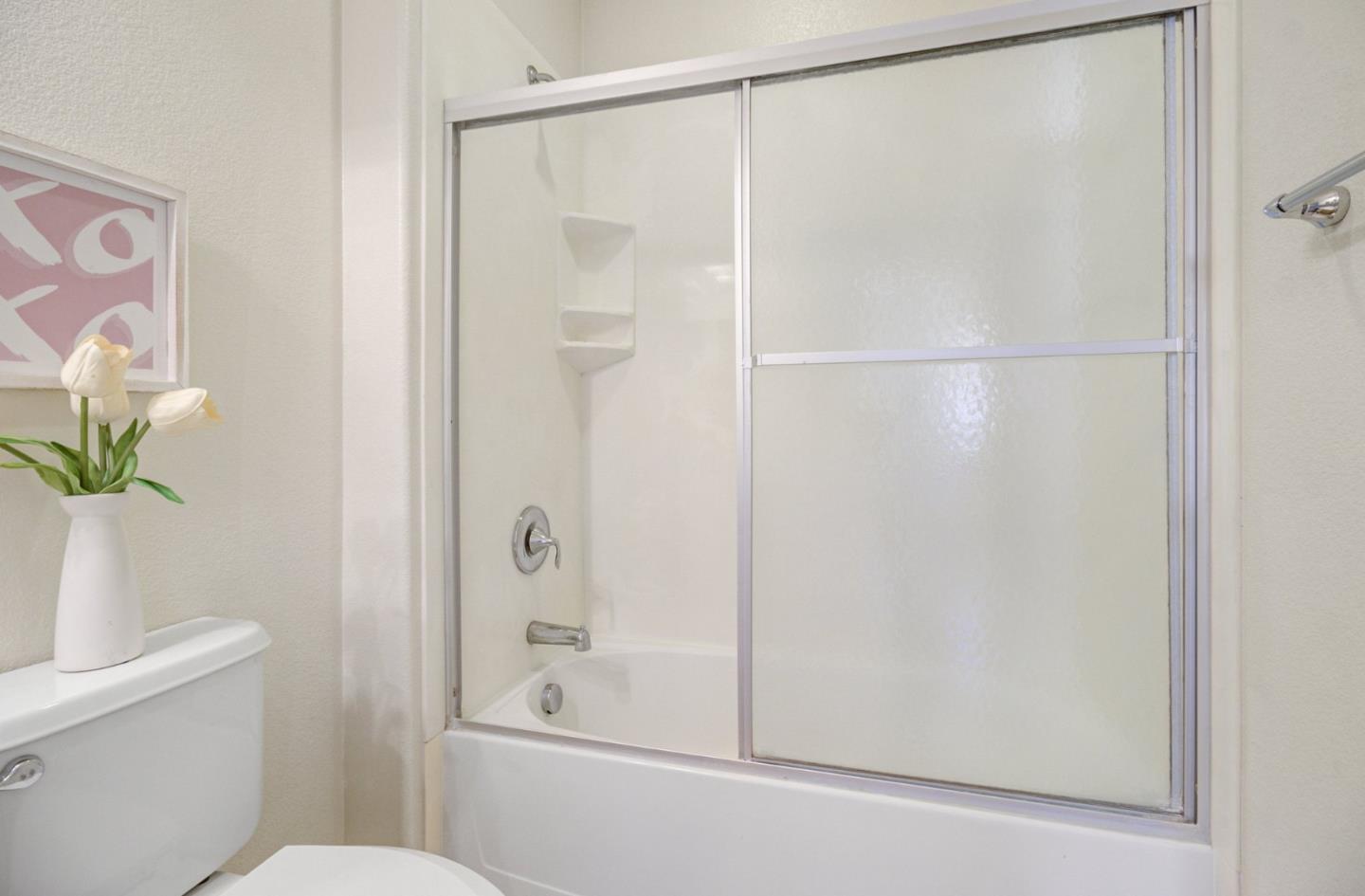 5056 Fioli Loop San Ramon, CA 94582 - Photo 25 of 44 a bathroom with a shower and a toilet