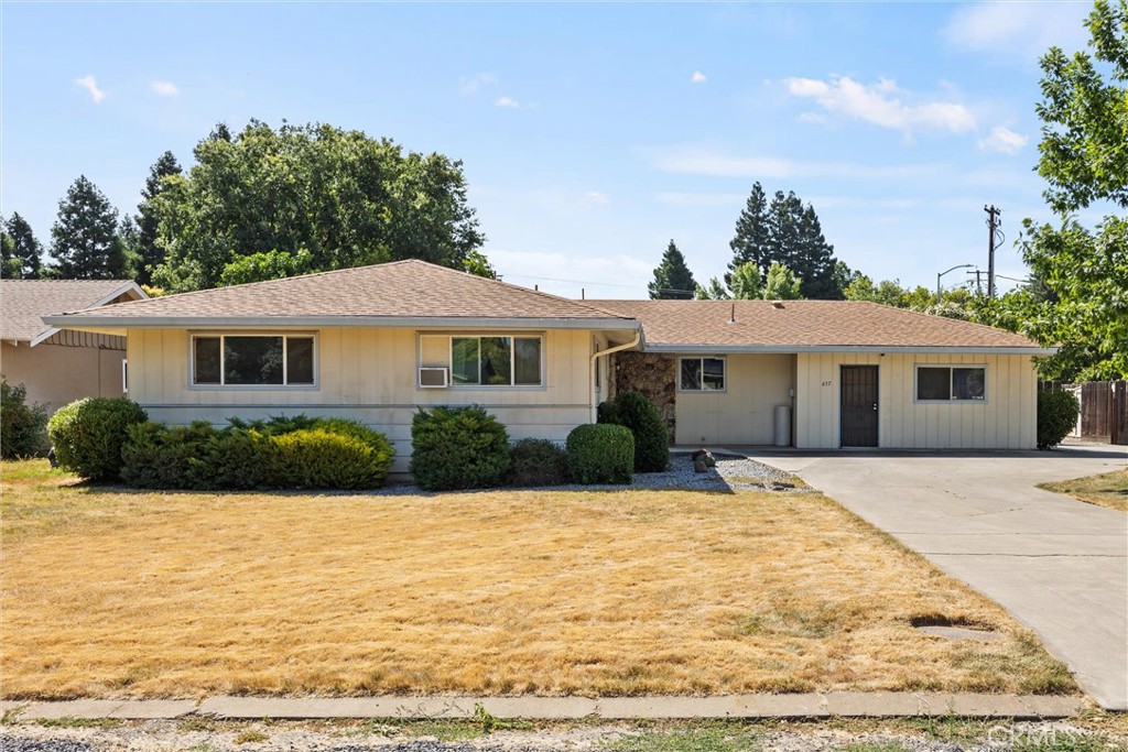 657 Villa Drive Chico, CA 95973 - Photo 2 of 40 a front view of a house with yard patio and swimming pool