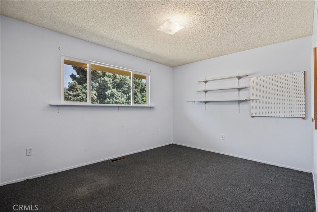 657 Villa Drive Chico, CA 95973 - Photo 24 of 40 an empty room with shelves