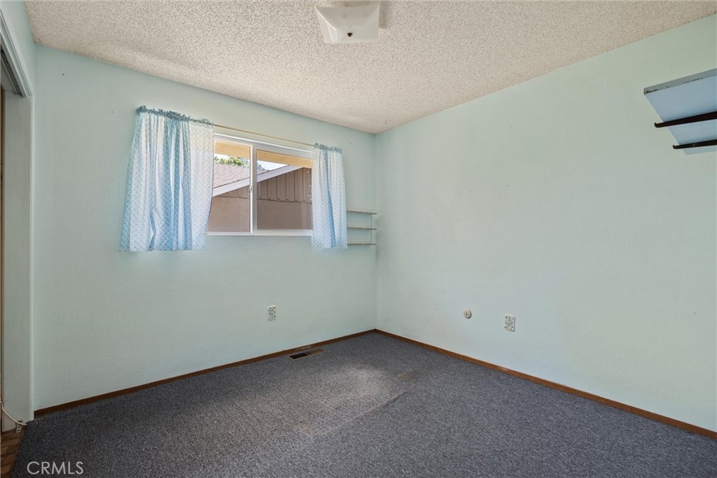 657 Villa Drive Chico, CA 95973 - Photo 25 of 40 an empty room with a window