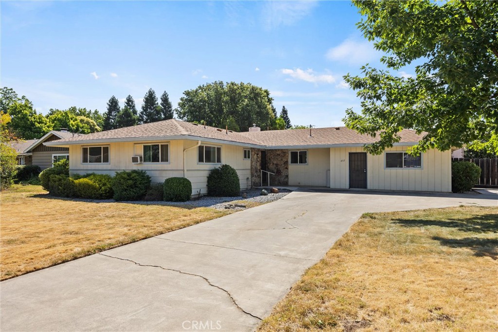 657 Villa Drive Chico, CA 95973 - Photo 3 of 40 a front view of a house with a yard