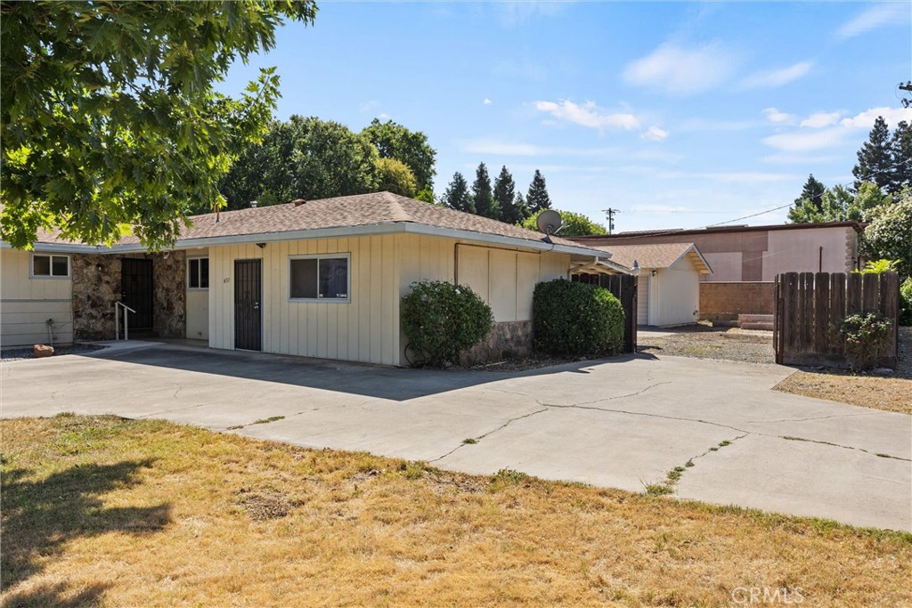 657 Villa Drive Chico, CA 95973 - Photo 4 of 40 a front view of a house with a yard