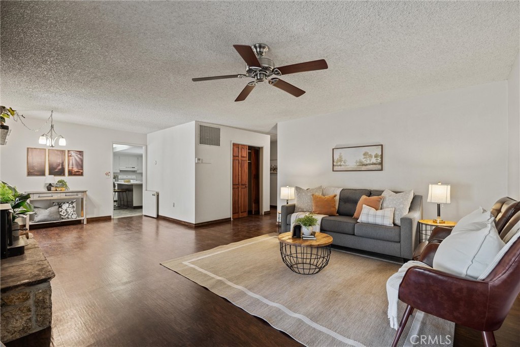 657 Villa Drive Chico, CA 95973 - Photo 6 of 40 a living room with furniture and a wooden floor