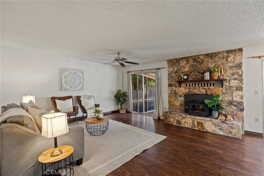 657 Villa Drive Chico, CA 95973 - Photo 8 of 40 a living room with furniture and a fireplace