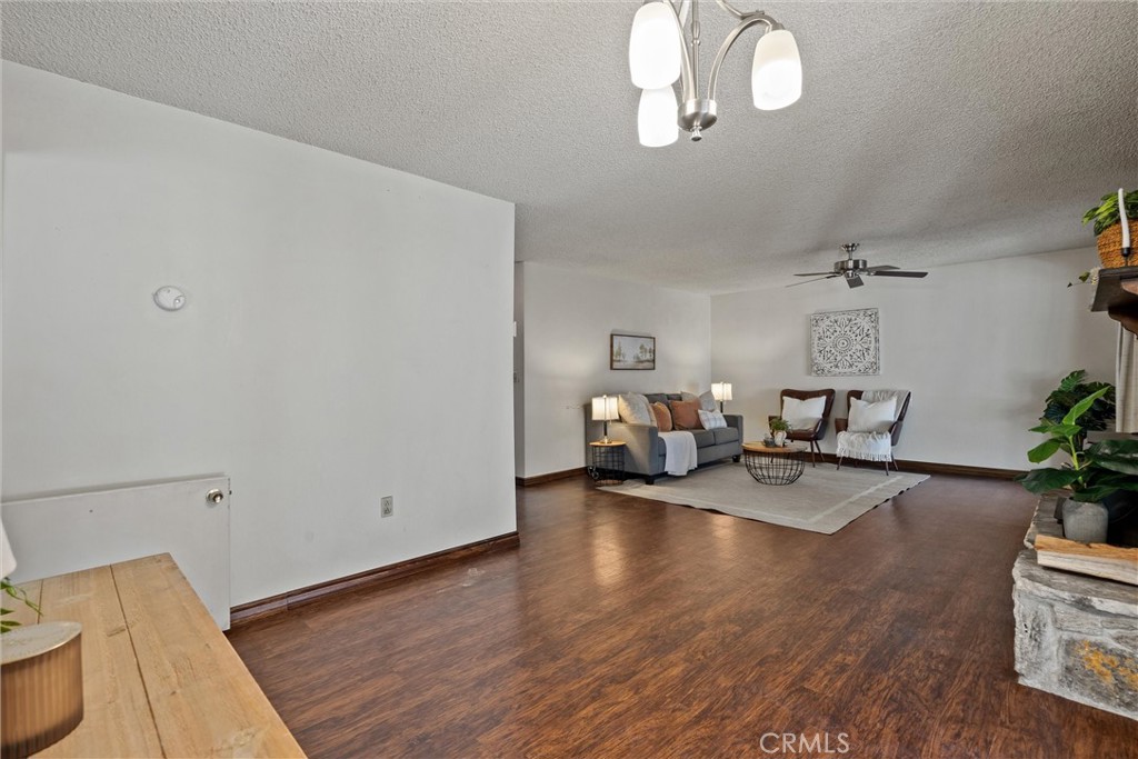 657 Villa Drive Chico, CA 95973 - Photo 10 of 40 a living room with furniture and a wooden floor