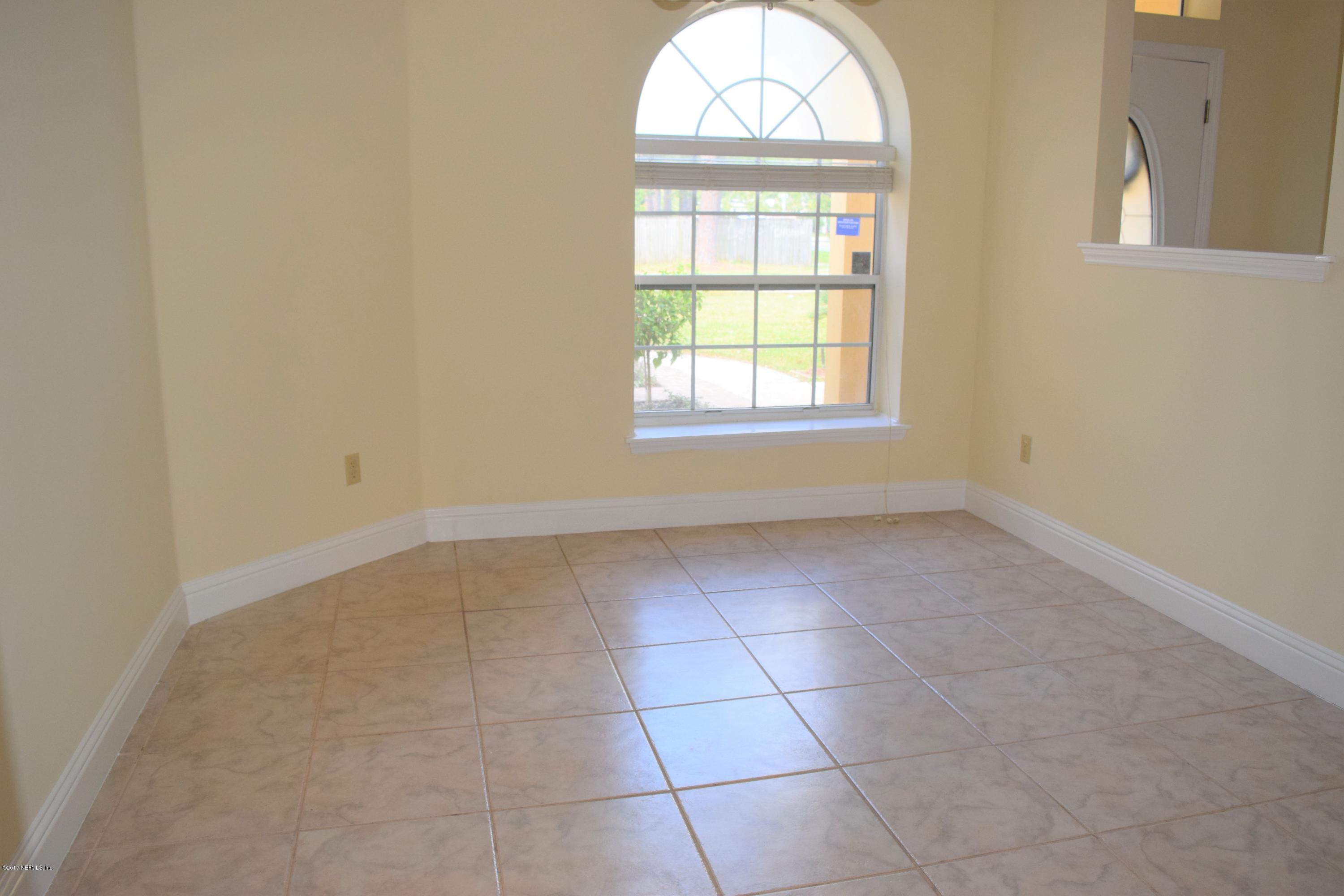 6658 Bennett Road Jacksonville, FL 32216 - Photo 14 of 19 an empty room with a window