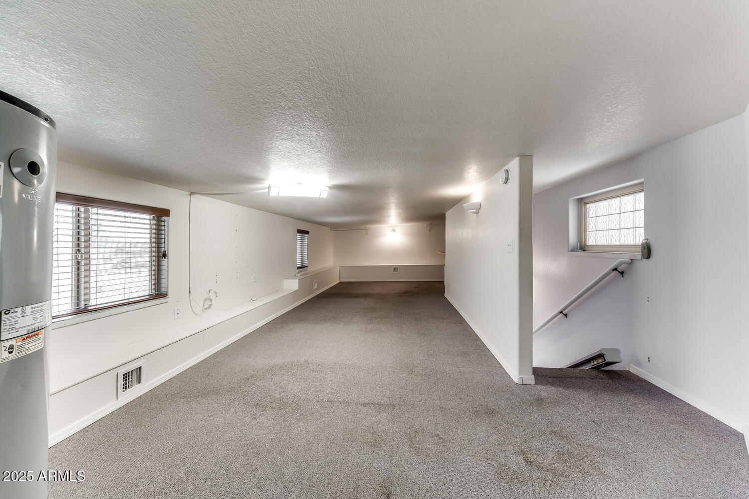 17200 West Bell Road, Unit 1801 Surprise, AZ 85374 - Photo 17 of 40 an empty room with windows