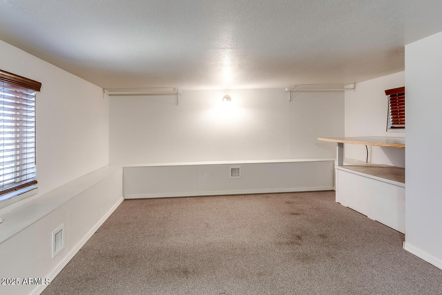 17200 West Bell Road, Unit 1801 Surprise, AZ 85374 - Photo 18 of 40 a view of an empty room with a window