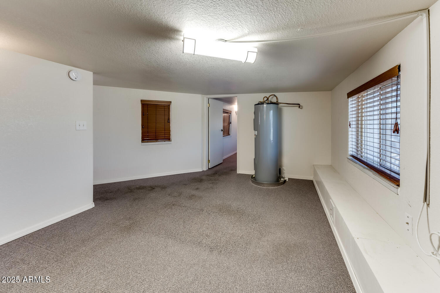 17200 West Bell Road, Unit 1801 Surprise, AZ 85374 - Photo 19 of 40 a view of a livingroom with a staircase