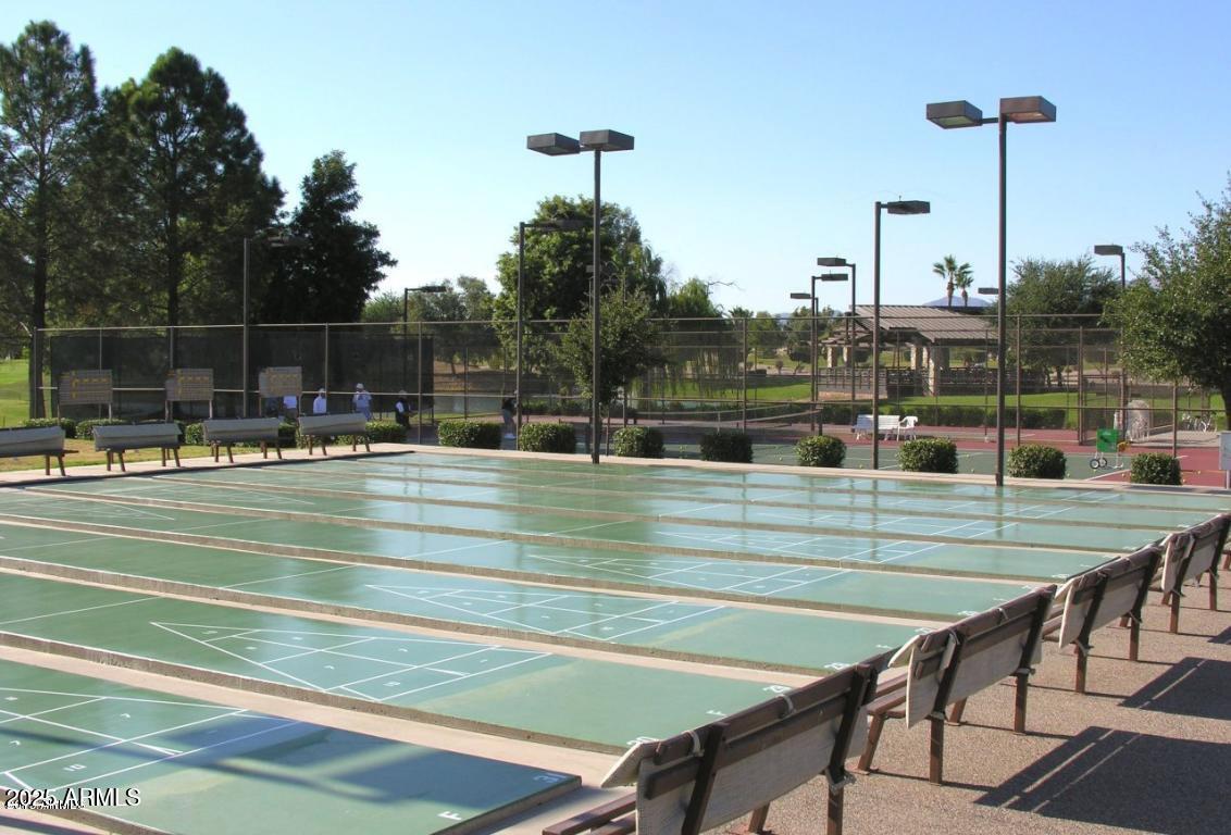 17200 West Bell Road, Unit 1801 Surprise, AZ 85374 - Photo 35 of 40 a view of a swimming pool with outdoor seating