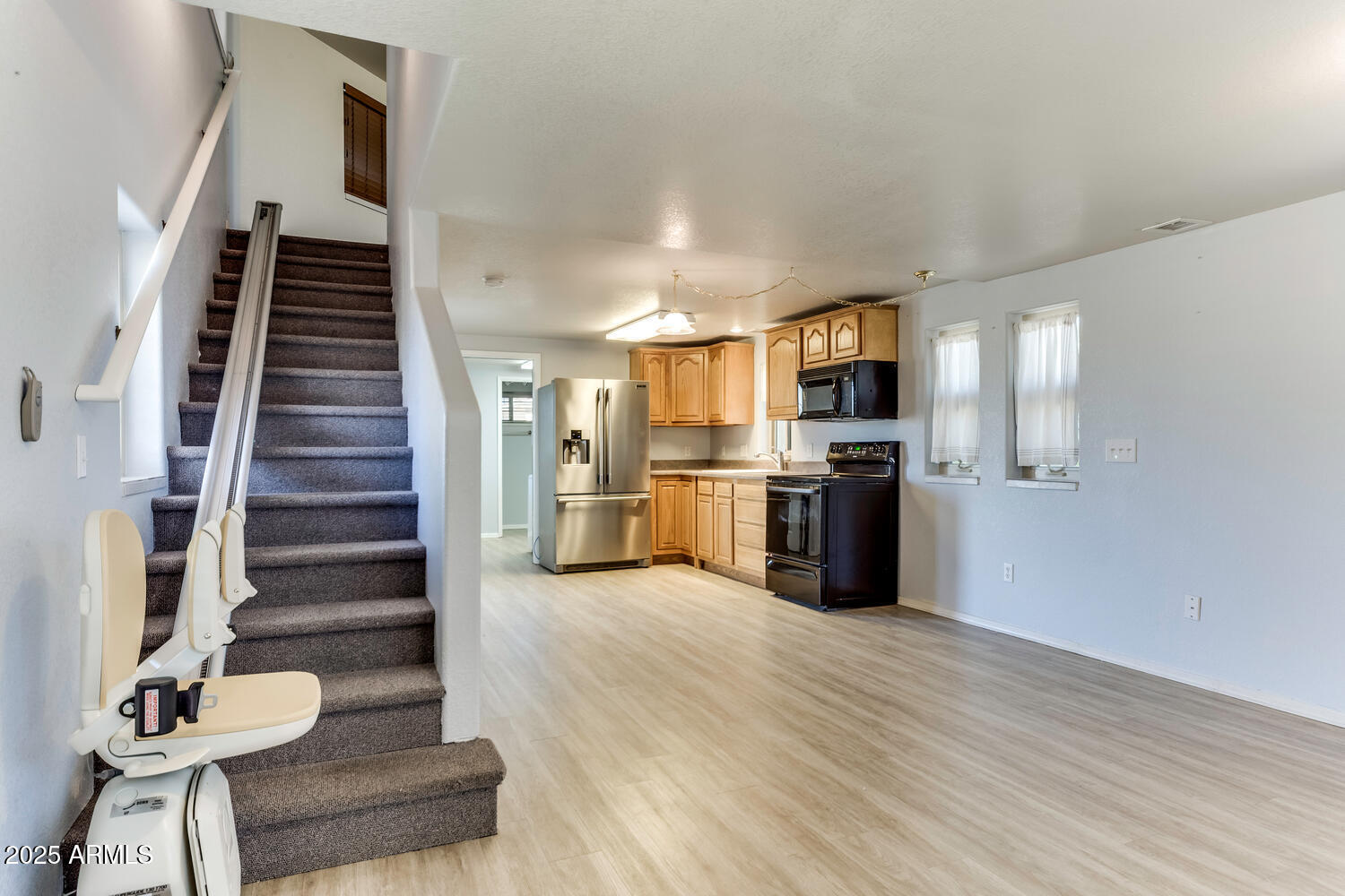 17200 West Bell Road, Unit 1801 Surprise, AZ 85374 - Photo 10 of 40 a view of kitchen with furniture and wooden floor