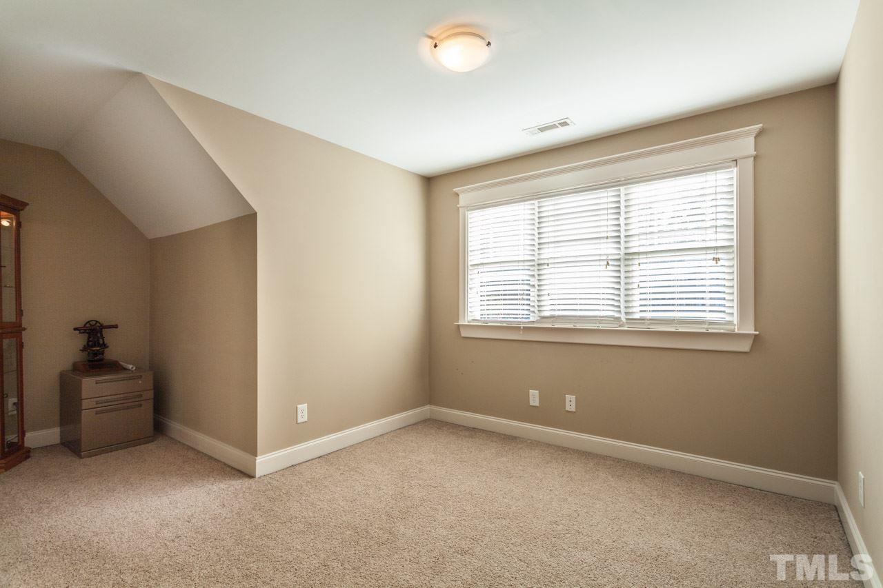 47 High Ridge Court Willow Spring, NC 27592 - Photo 20 of 25 a big room with windows and closet