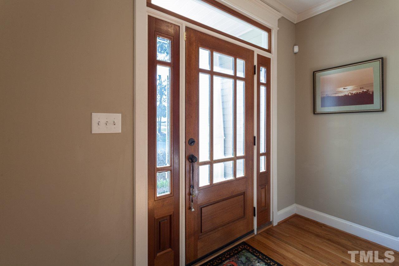 47 High Ridge Court Willow Spring, NC 27592 - Photo 3 of 25 a view of an entryway with wooden floor