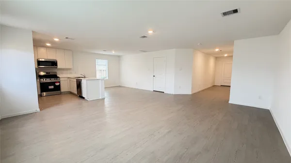 a view of kitchen and windows