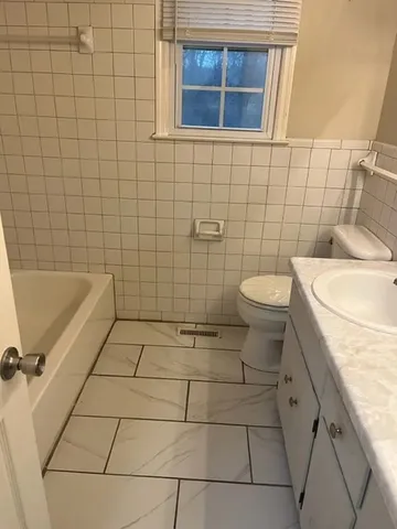 a bathroom with a sink and a toilet
