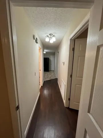 a view of hallway with stairs