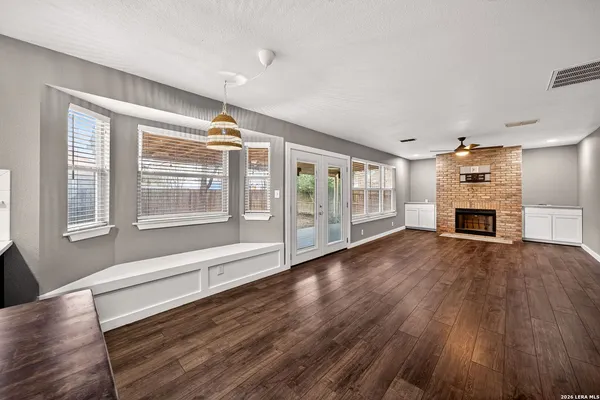 a view of livingroom with furniture wooden floor and window