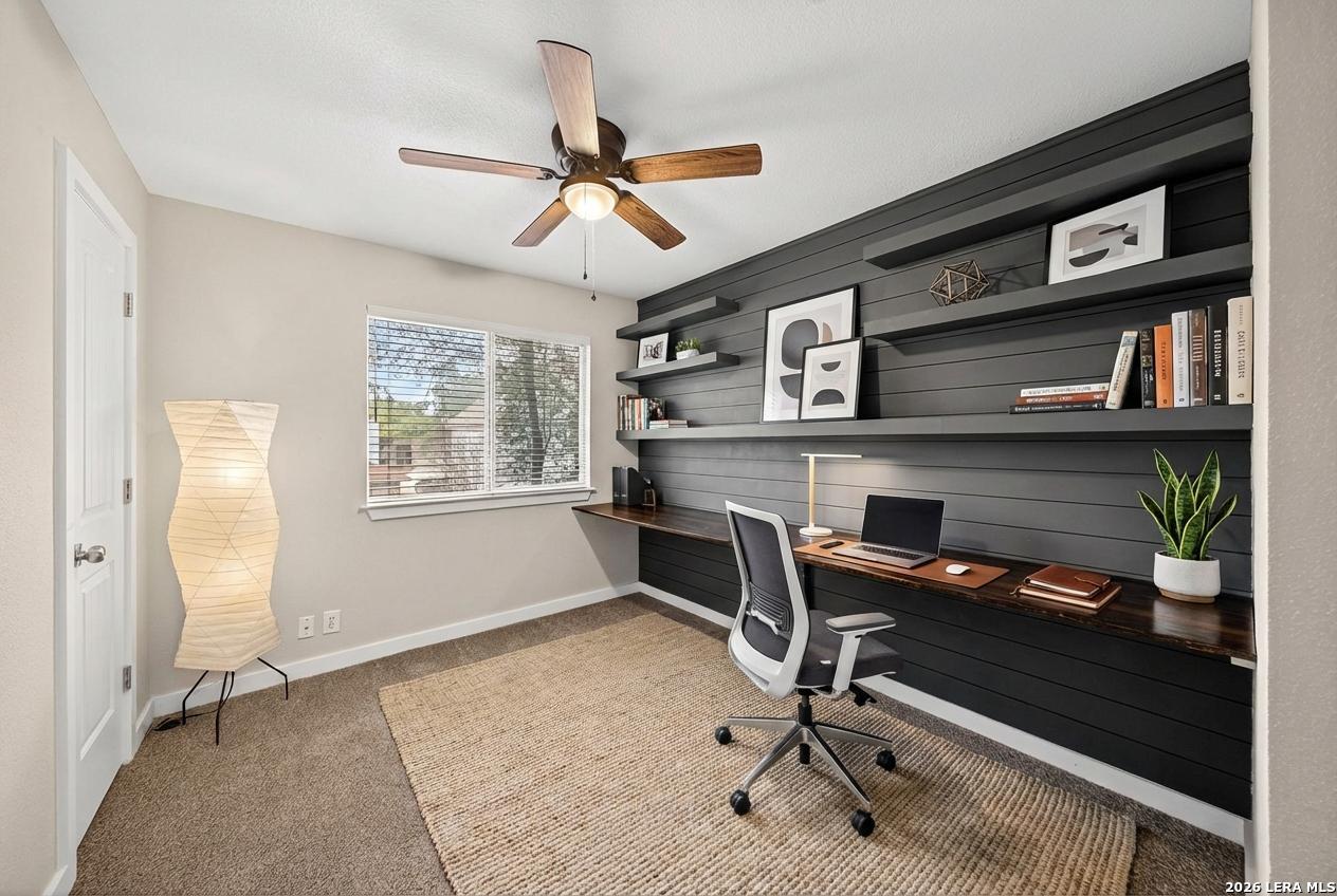 1016 Mourning Dove Schertz, TX 78154 - Photo 20 of 40 a view of a workspace with furniture and a window