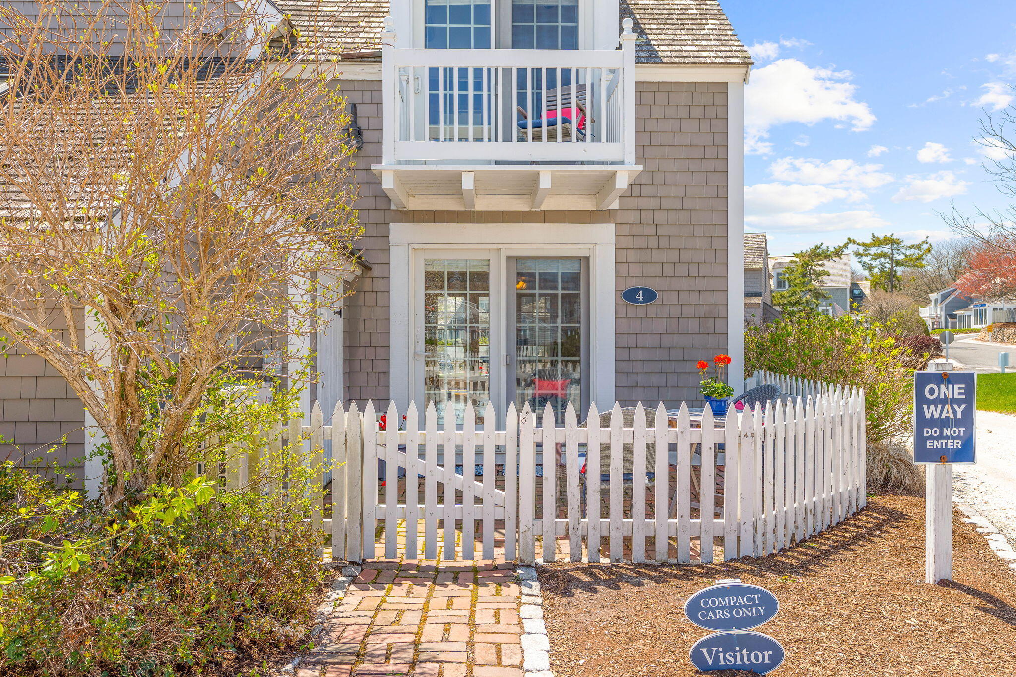 4 Race Point Road, Unit 4 Mashpee, MA 02649 - Photo 9 of 43 a front view of a house