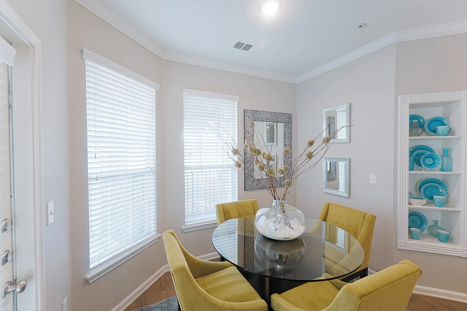 10505 South I-35 Frontage Road, Unit 118 Austin, TX 78747 - Photo 15 of 20 a view of a dining room with furniture and wooden floor