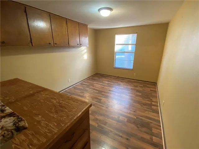 a view of an empty room and window