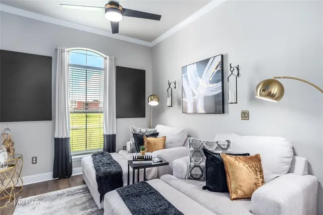 a living room with furniture and window