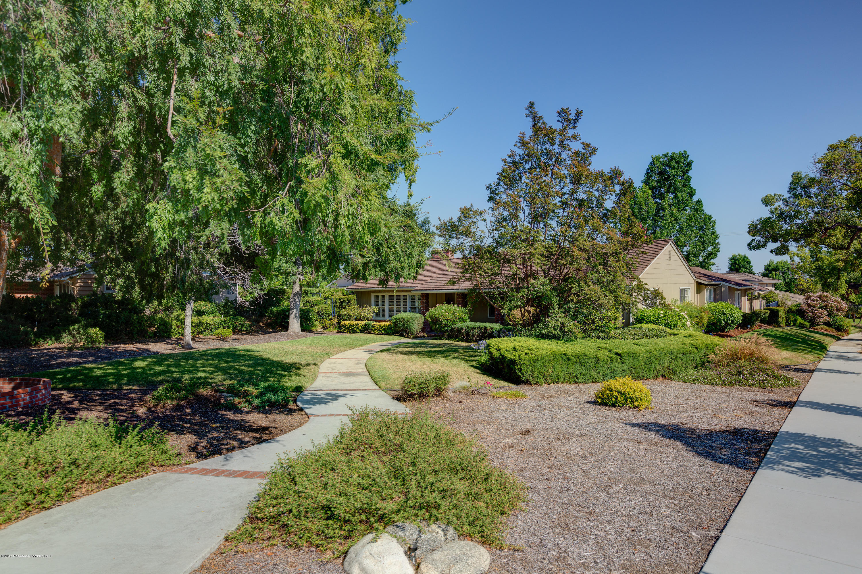 3740 Greenhill Road Pasadena, CA 91107 - Photo 2 of 23 a view of a garden with a pathway