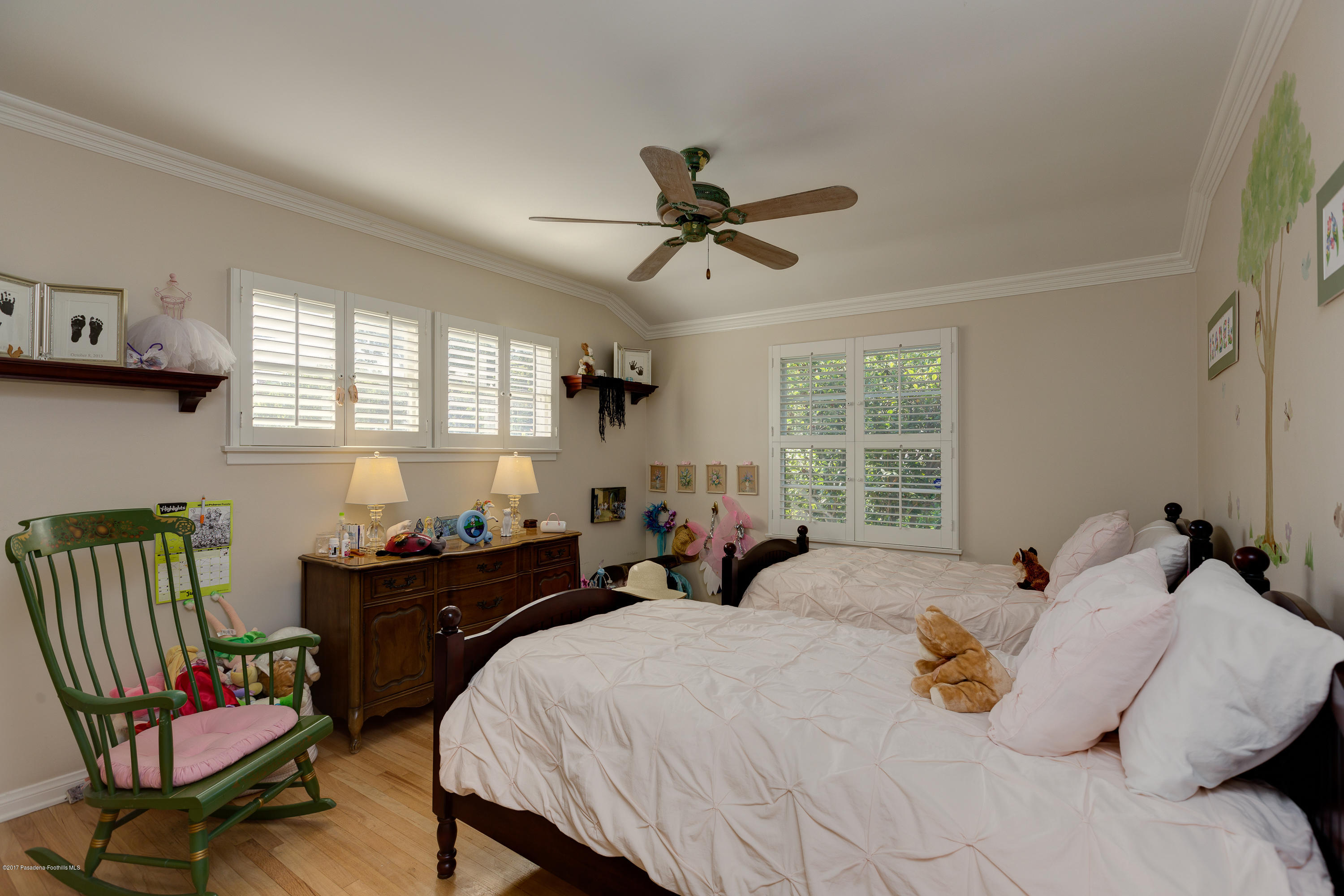 3740 Greenhill Road Pasadena, CA 91107 - Photo 15 of 23 a bedroom with a bed and a chair