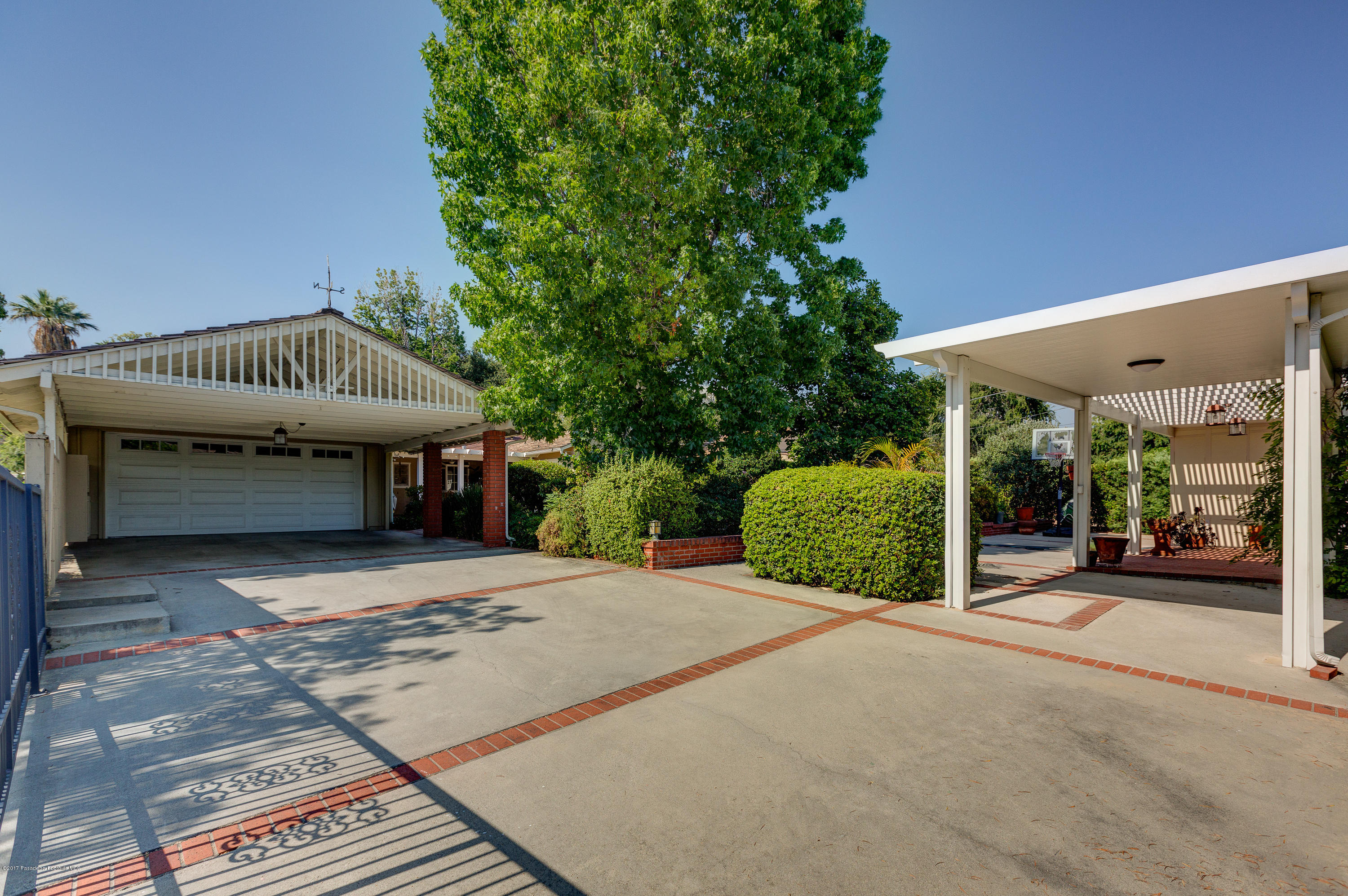 3740 Greenhill Road Pasadena, CA 91107 - Photo 23 of 23 a view of a house with a patio