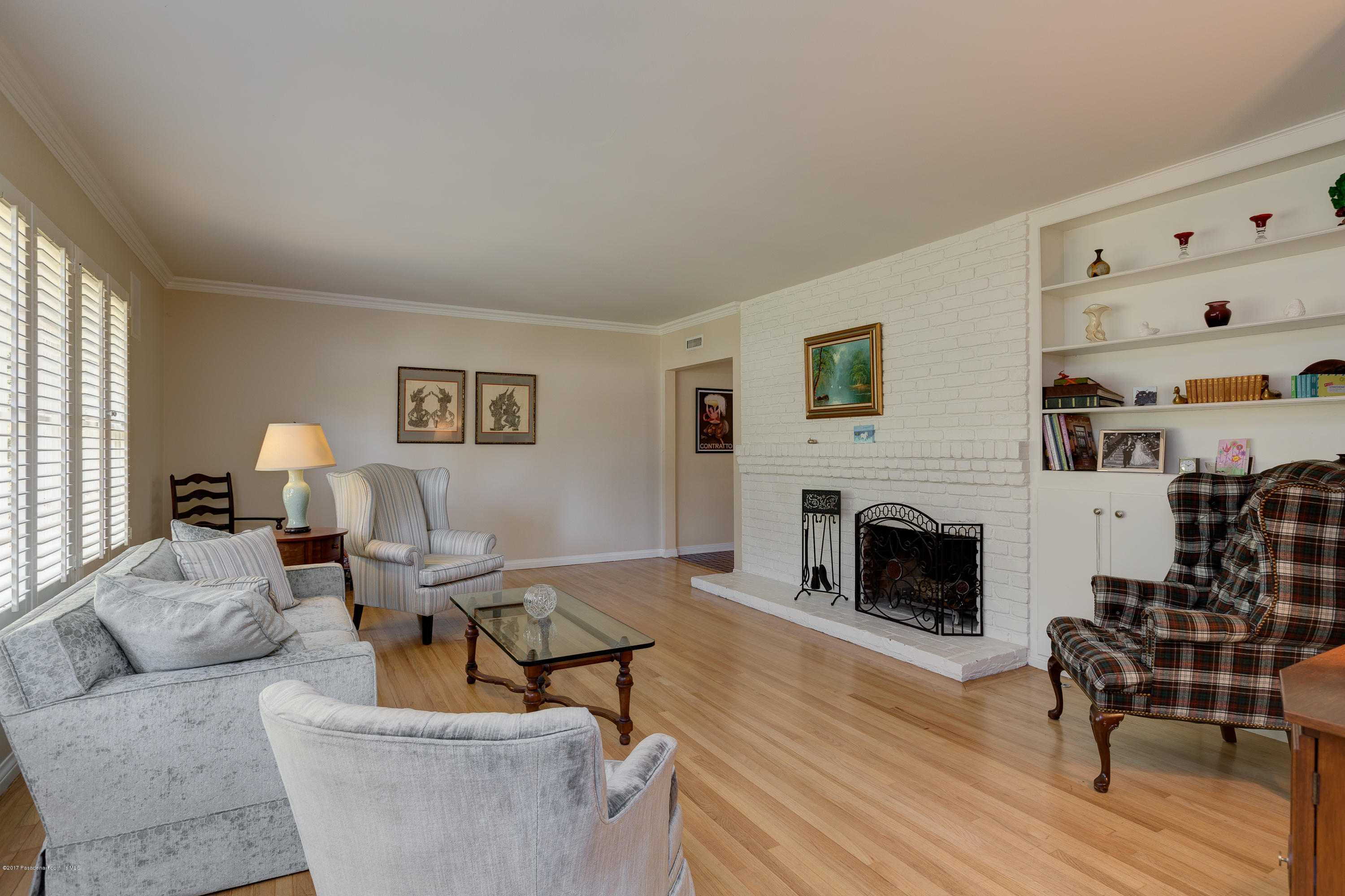 3740 Greenhill Road Pasadena, CA 91107 - Photo 5 of 23 a living room with furniture and a fireplace