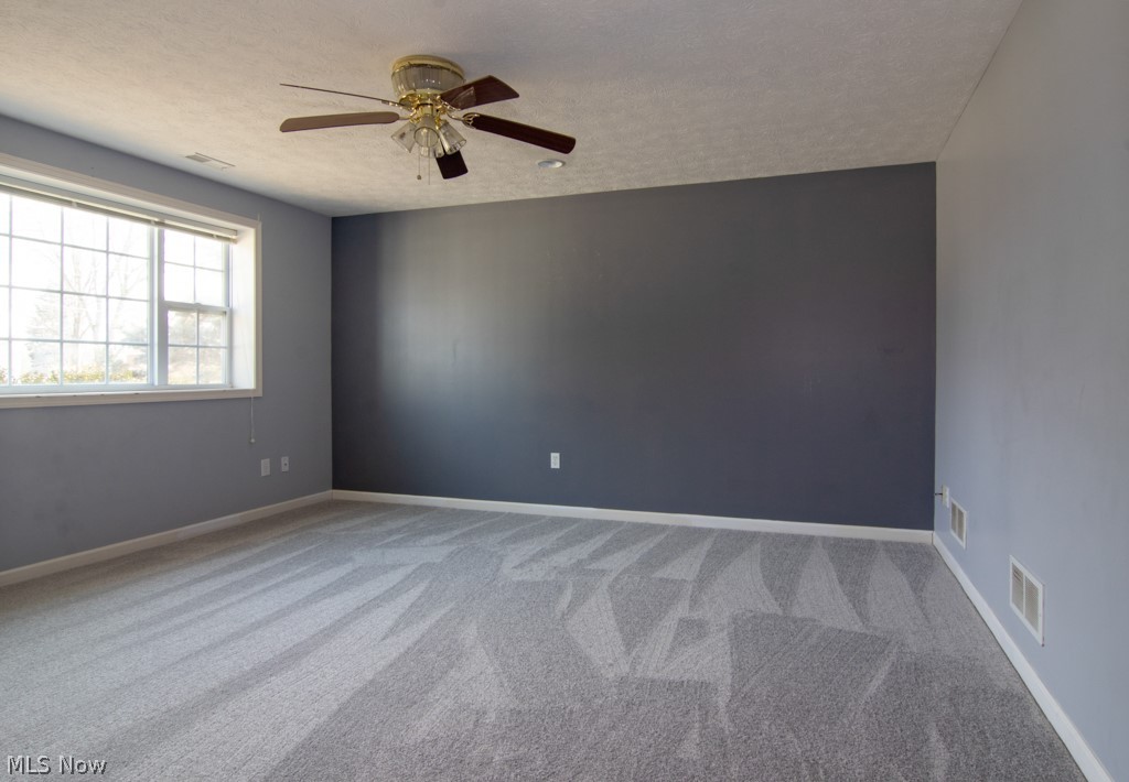 4140 South Hametown Road Norton, OH 44203 - Photo 24 of 34 Here's the recreation room with tons of natural light and brand new carpeting!