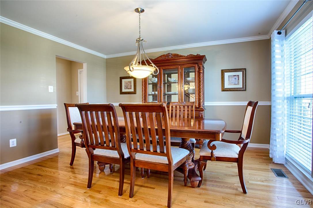 14 Lower Way Road Easton, PA 18045 - Photo 10 of 32 Dining room with hardwood floors and crown and cha