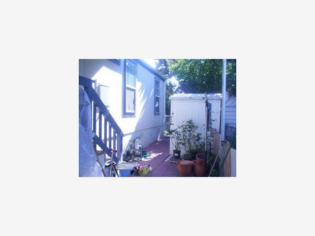 411 Lewis Road, Unit 276 San Jose, CA 95111 - Photo 9 of 9 a picture of a person on a street