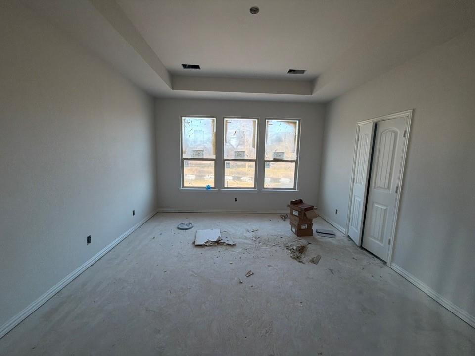 1249 Sabine River Lane Springtown, TX 76082 - Photo 6 of 9 wooden floor and window in a room