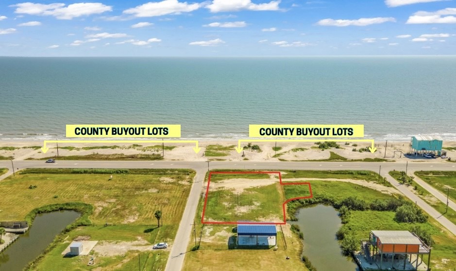 a view of a swimming pool with a lawn chairs