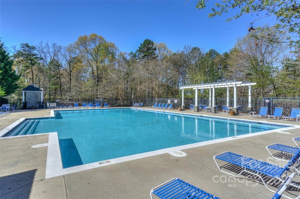 20025 North Cove Road Cornelius, NC 28031 - Photo 44 of 45 a view of a house with a swimming pool