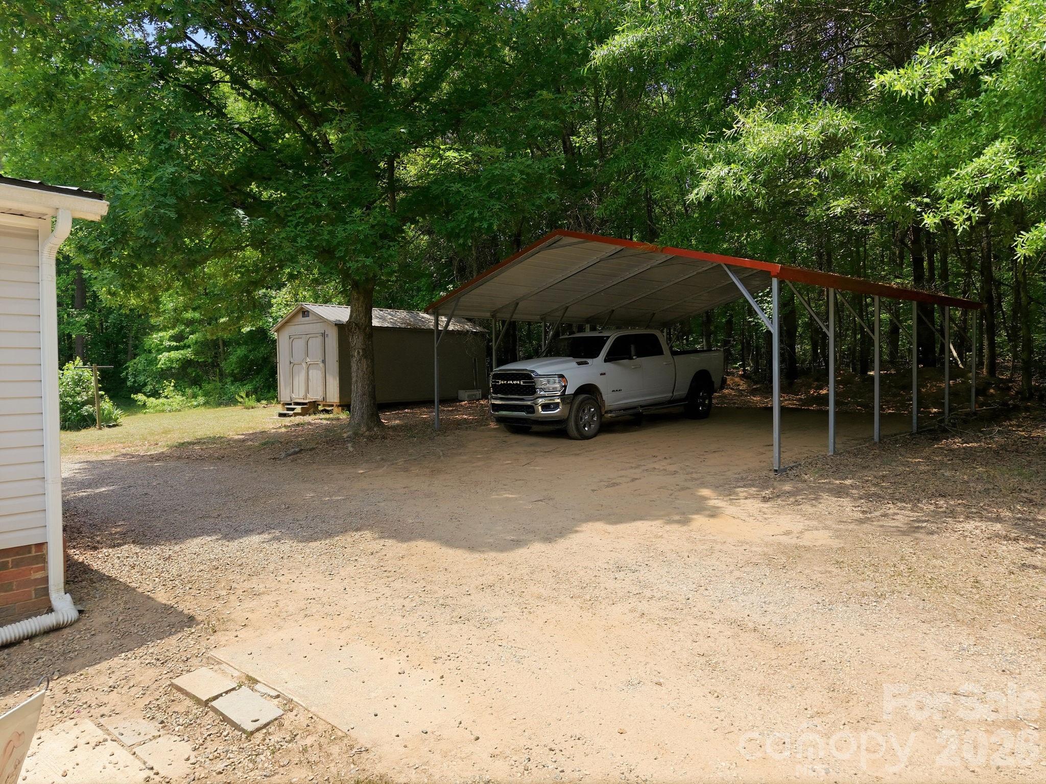 675 Overcash Road Salisbury, NC 28147 - Photo 33 of 48 a view of a car parked in back of a house