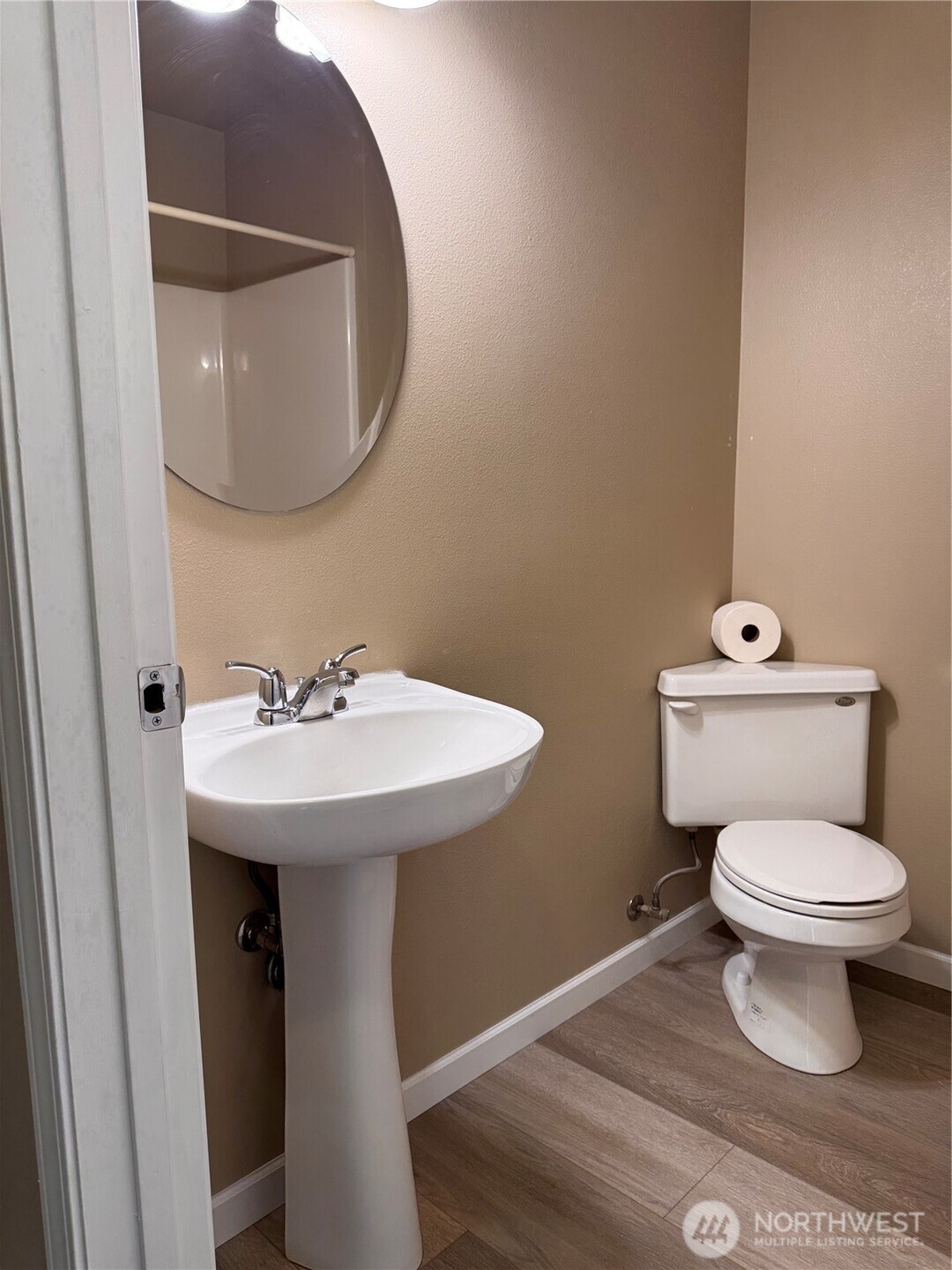 315 North Spangle Avenue Spangle, WA 99031 - Photo 13 of 38 a bathroom with a sink toilet and a mirror