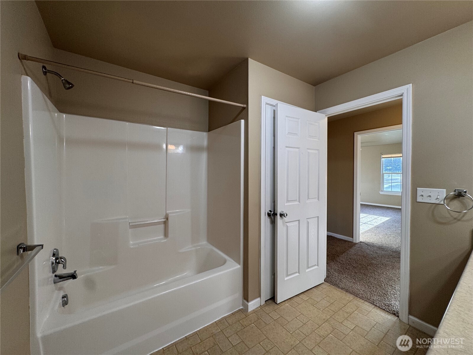 315 North Spangle Avenue Spangle, WA 99031 - Photo 26 of 38 a bathroom with a tub shower vanity and a sink