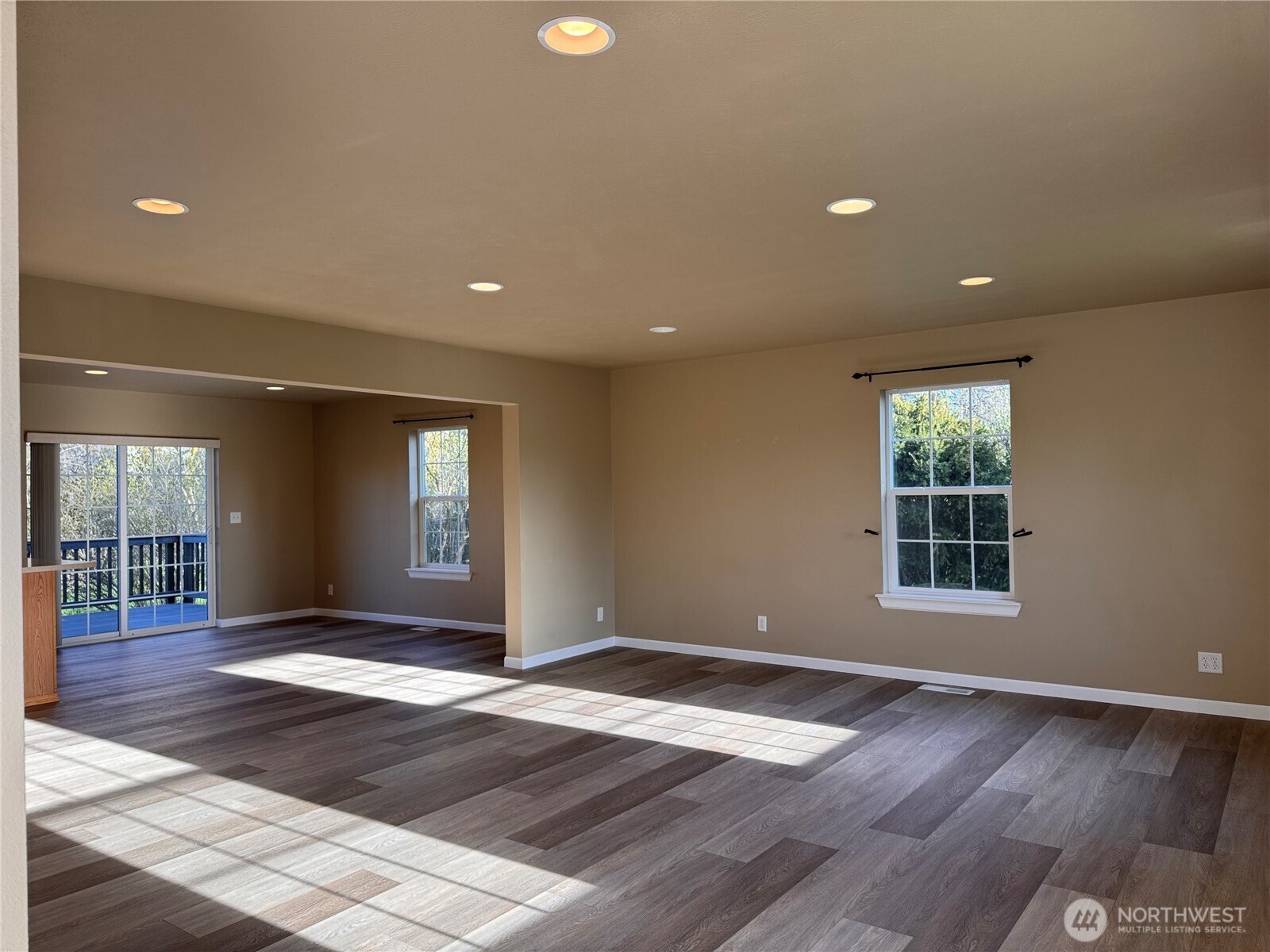 315 North Spangle Avenue Spangle, WA 99031 - Photo 5 of 38 a view of an empty room with wooden floor and a window