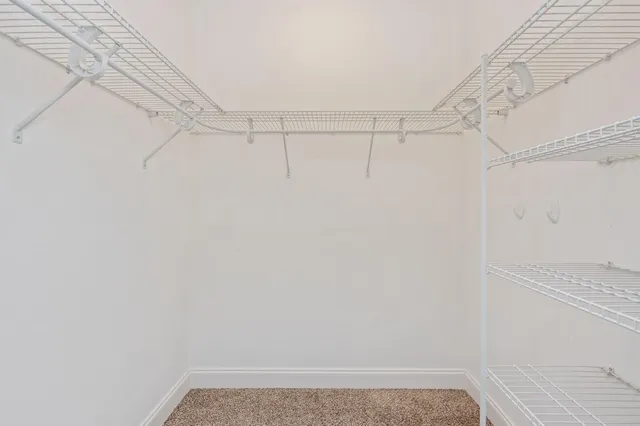 a view of a room with racks on the wall