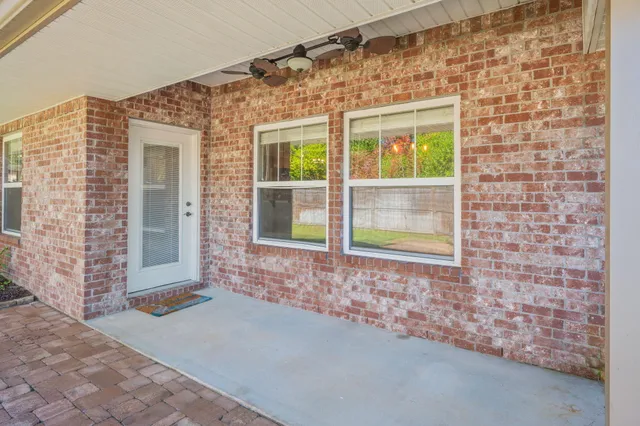 a view of front door of house with window