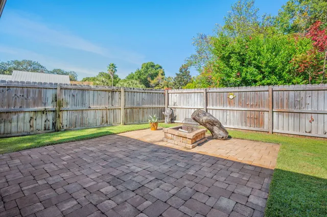 a view of a backyard with a slide