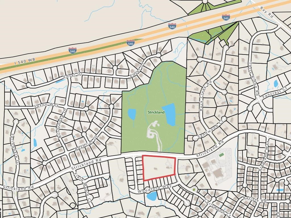 12801 Strickland Road Raleigh, NC 27613 - Photo 2 of 27 a sign on the wall