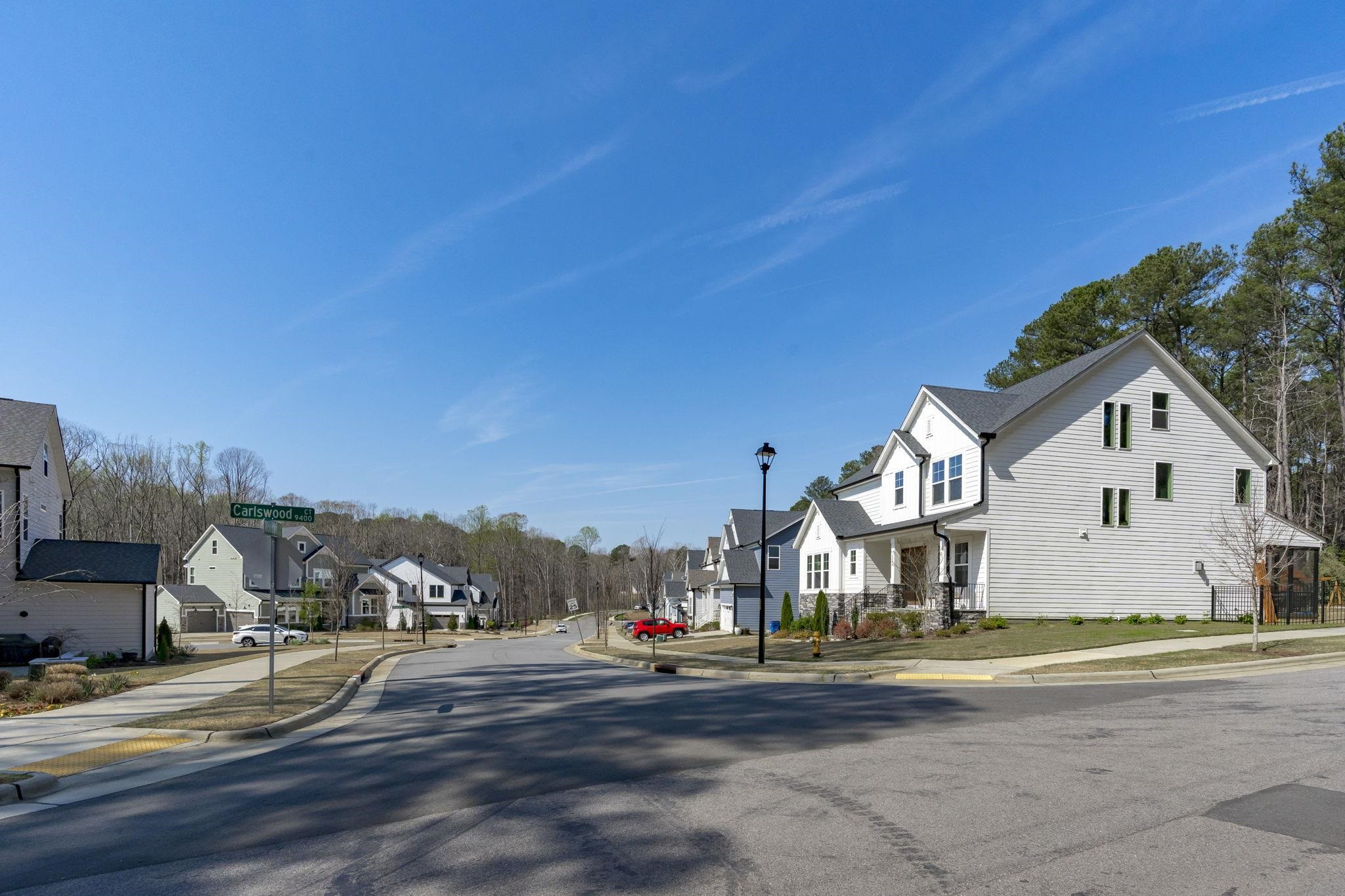 12801 Strickland Road Raleigh, NC 27613 - Photo 24 of 27 a view of street with houses