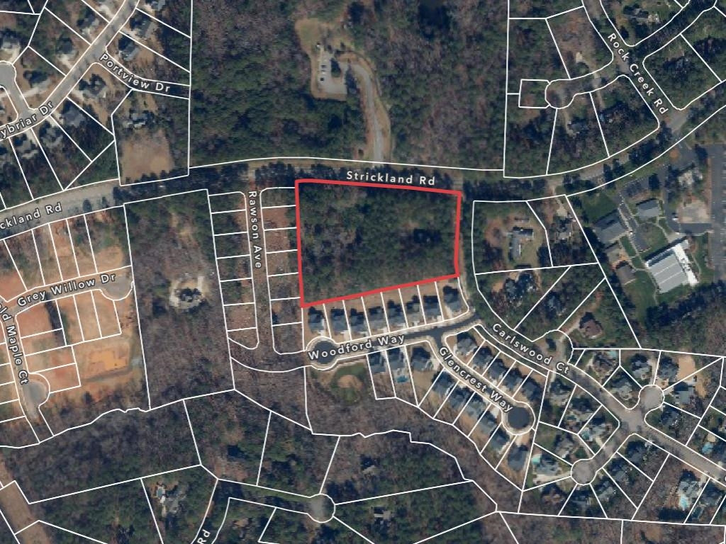 12801 Strickland Road Raleigh, NC 27613 - Photo 3 of 27 a picture of a tennis court with a shower