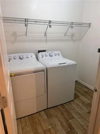 a utility room with dryer and washer