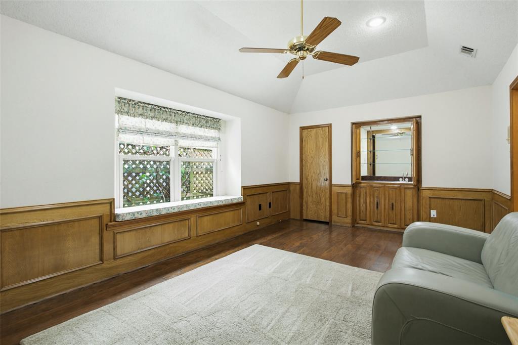 2905 Valleyview Drive Grapevine, TX 76051 - Photo 5 of 12 a living room with furniture and a window