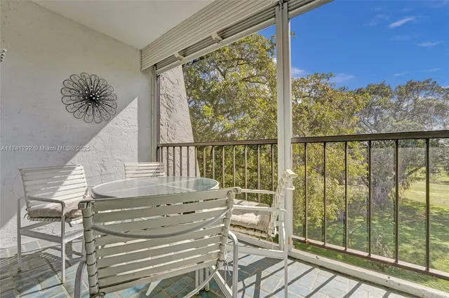 a view of a balcony with chairs